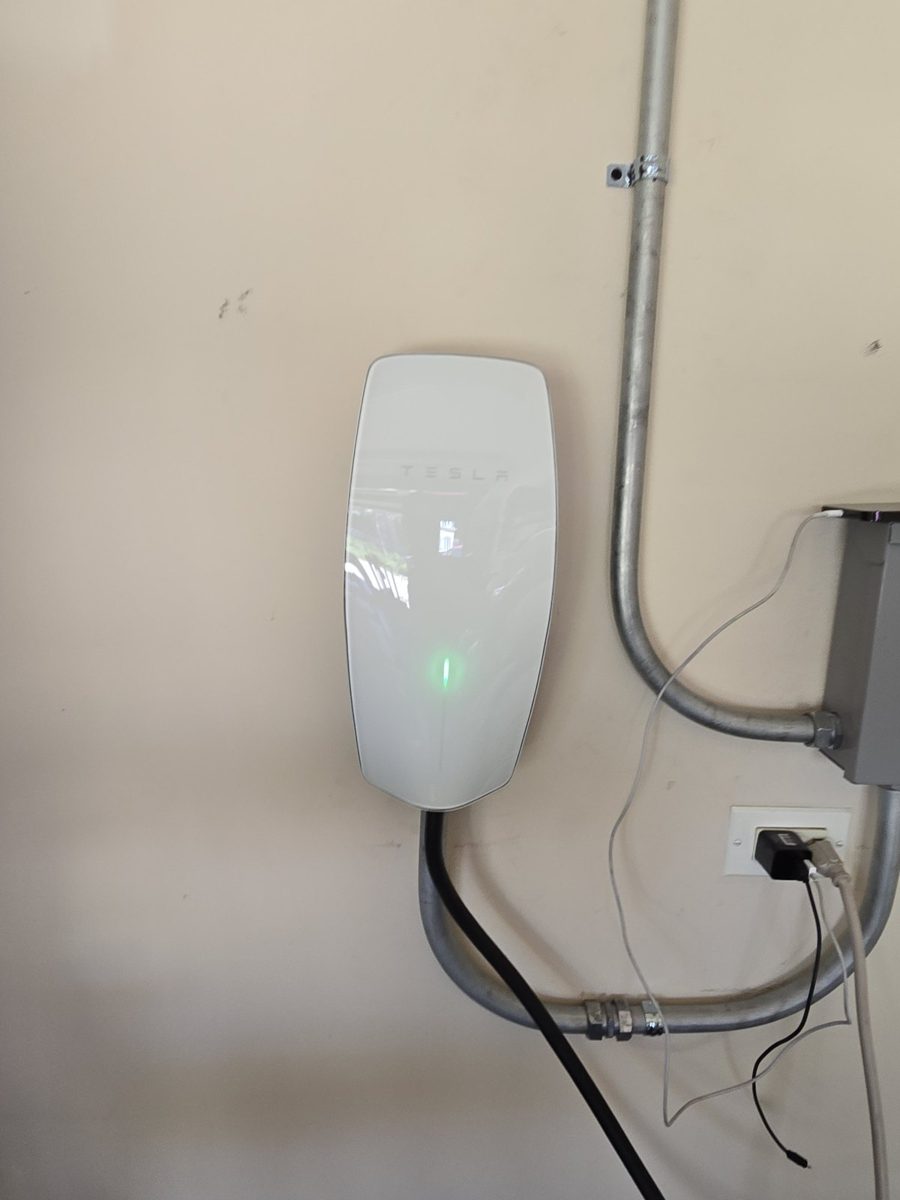 Wall-mounted EV charger with dedicated circuit