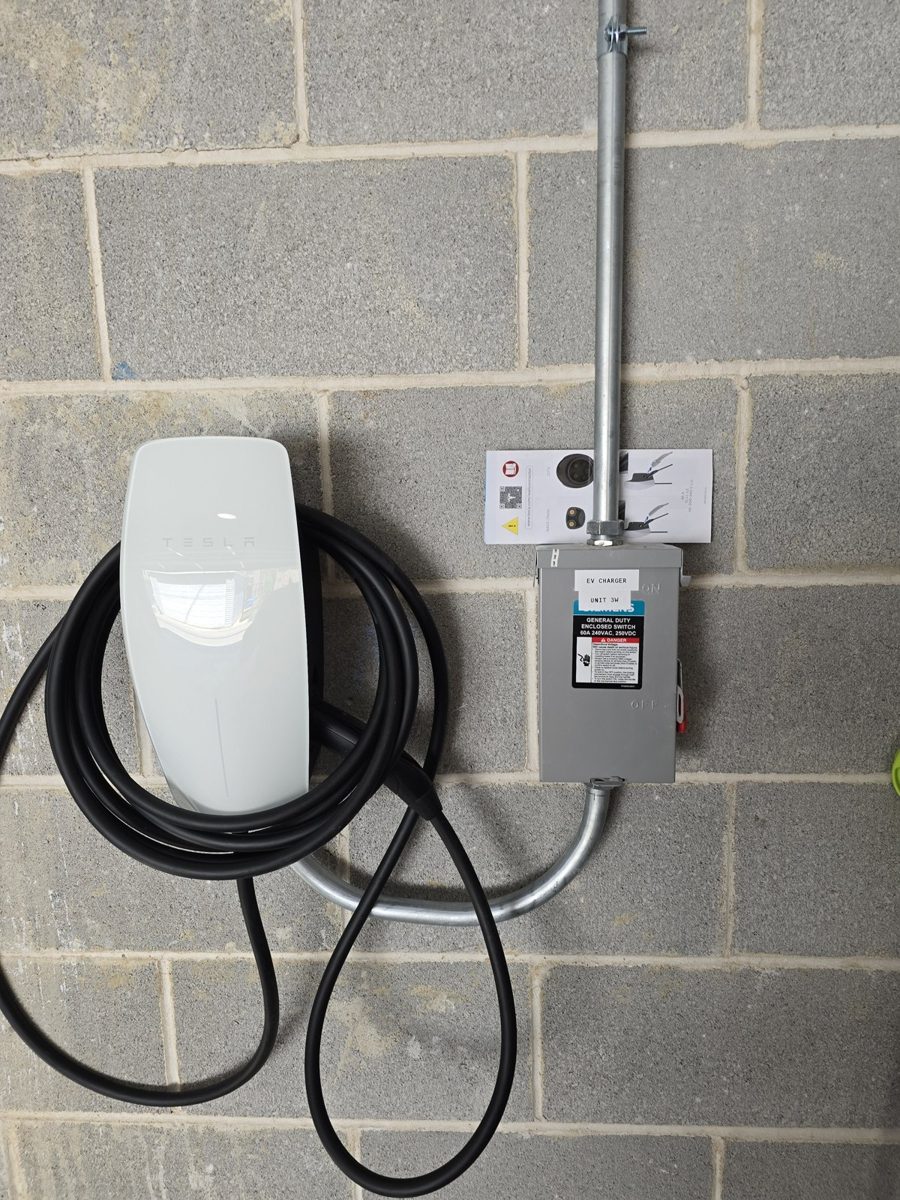 EV charger with disconnect on masonry wall